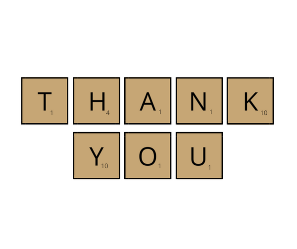 White seed paper greeting card saying "Thank You" in scrabble like tiles