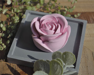 Pink concrete rose on square concrete trinket dish