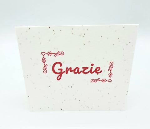 Plantable seed card with "Grazie" in pink.