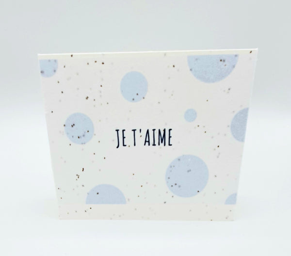 Plantable seed card with blue circles "Je T'aime"