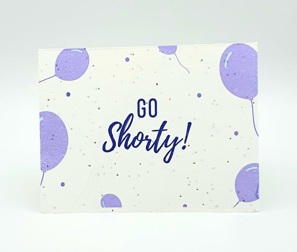 Plantable seed card with purple balloons and "Go Shorty!" in purple.