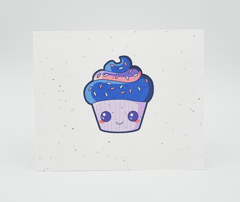Plantable seed paper card with purple cupcake with face on it.