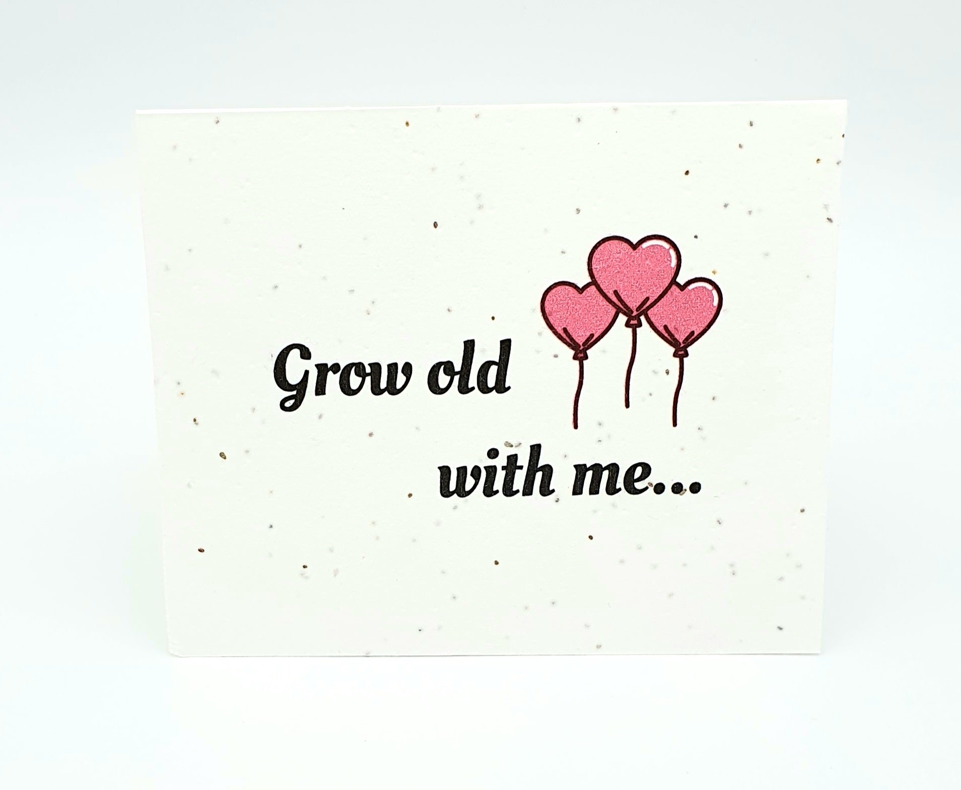 Plantable seed card with "Grow old with me..." and 3 pink heart balloons.