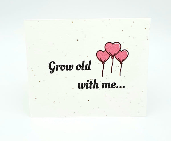 Plantable seed card with "Grow old with me..." and 3 pink heart balloons.