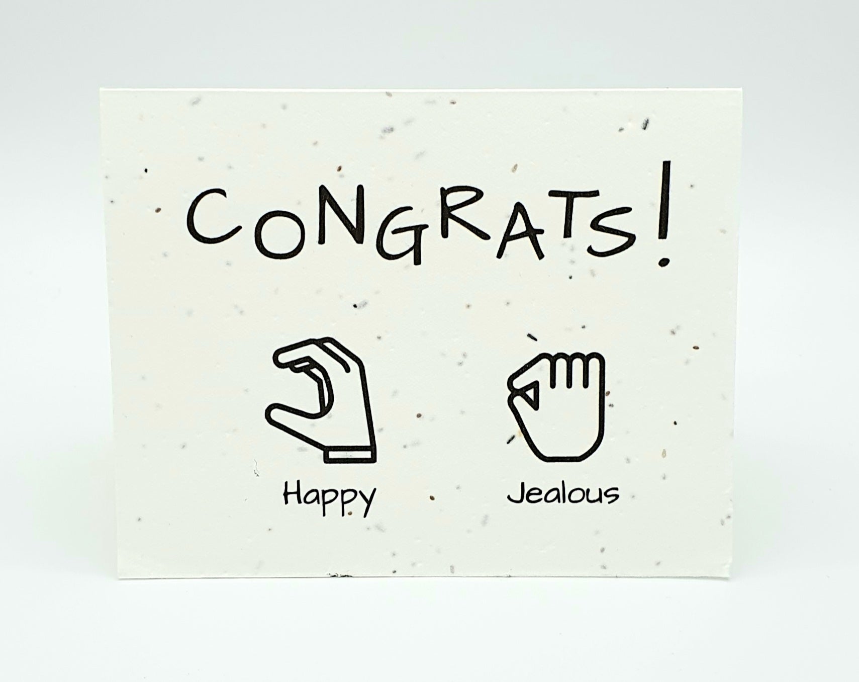 Plantable seed card with "Congrats!" and two hand images - one is "Happy", one is "Jealous".