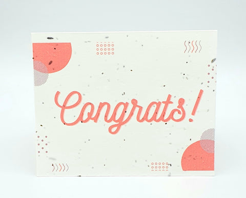 Plantable seed card with various peach coloured geometric shapes and "Congrats!" in cursive.