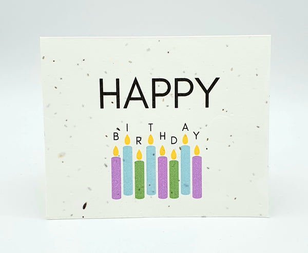 Plantable seed card with "Happy Birthday" and different coloured candles.