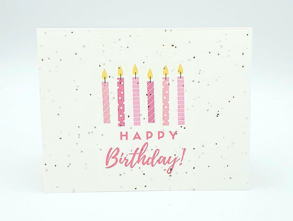 Plantable seed card with pink "Happy Birthday" and pink candles.