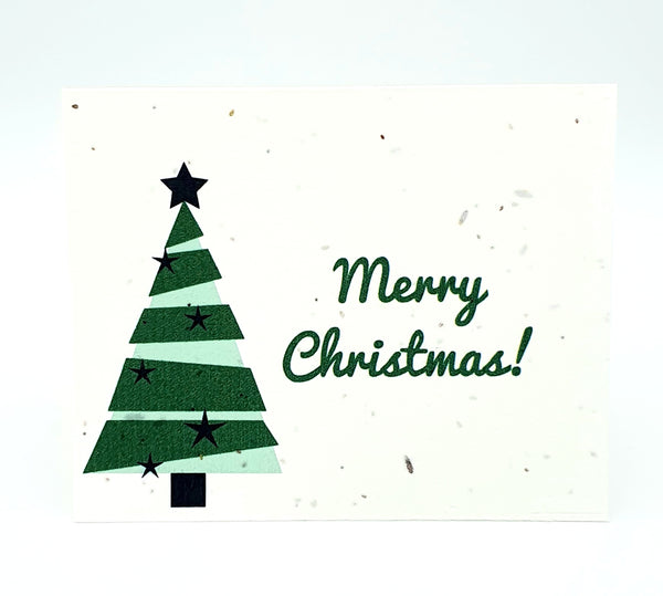 Plantable seed paper card with Merry Christmas! and green Christmas tree.