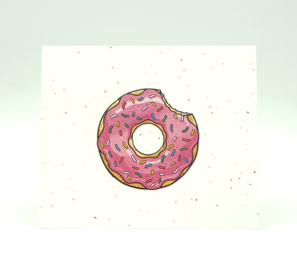 Plantable seed card with pink donut with sprinkles.