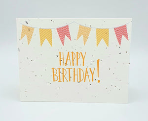 Plantable seed paper card with yellow and pink banner and yellow Happy Birthday!