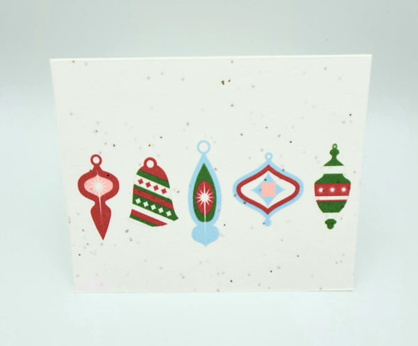 Plantable seed paper card with five vintage looking Christmas ornaments in blue green and red.