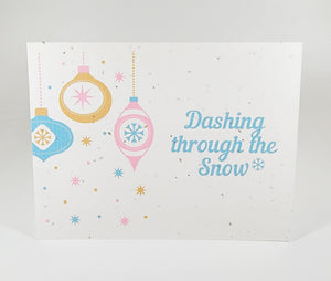 Plantable seed paper card Dashing through the snow vintage ornaments and snowflakes/stars.