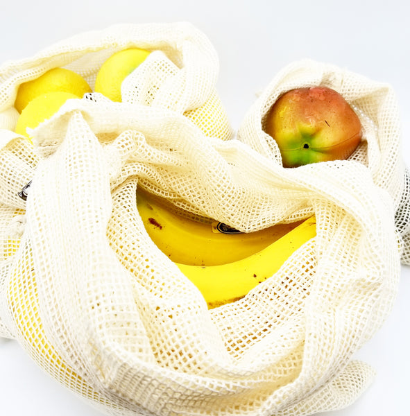 3 Pack Cotton mesh produce bags with fruit in them.